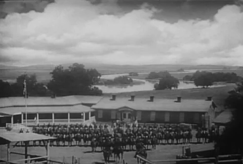 US cavalry unit on horseback lined up in formation at outpost, 1940s 動画素材 95997481
