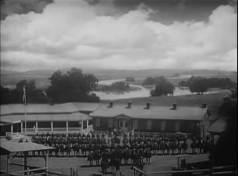 US cavalry unit standing in formation at outpost, 1940s 動画素材 260259258