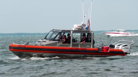 US Coast Guard 29 Foot Response Boat Small Slowly Passing on Lake St Clair Stock Footage 343793160