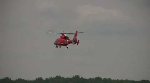 US Coast Guard helicopter hovering Stock Footage 8846421