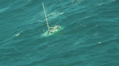 US: Coast Guard Jayhawk Rescues Five From Life Raft 260 Miles Off Cape Ha... Stock Footage 320978351