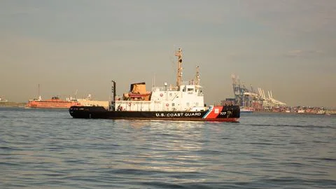 US Coast Guard large Boat in New York Harbor near Staten Island Ferry Stock Photos