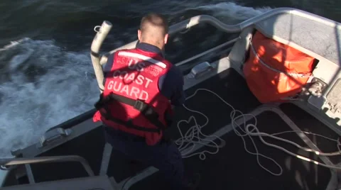 US Coast Guard putting line aboard Stock Footage 57652344