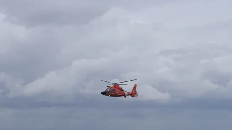Us coast guard rescue hovering helicopter flying low 2 Stock Footage 38765731
