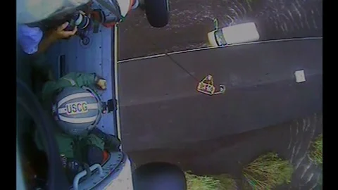 U.S. Coast Guard rescue man and his dog after Hurricane Florence - 2018 Stock Footage 101898686