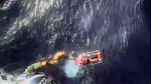 US: Coast Guard Rescues Two Men From Life Raft Near Molokai Stock Footage 324251973