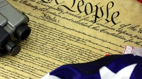 US Constitution with Hand Gun - Right To Keep and Bear Arms Stock Footage 58929700