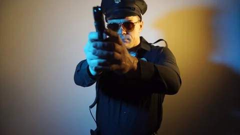 US COP shoots a gun Stock Footage 69883046
