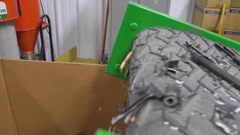 U.S. Customs and Border Protection personnel sort destroyed firearms on conveyor Stock Footage 333680846
