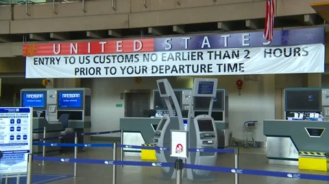 US Customs with sign, airport terminal Stock Footage