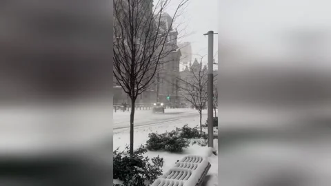 US: Daring Driver Spins Off-Road Buggy Around Snow-Covered Philadelphia C... Stock Footage 327683161