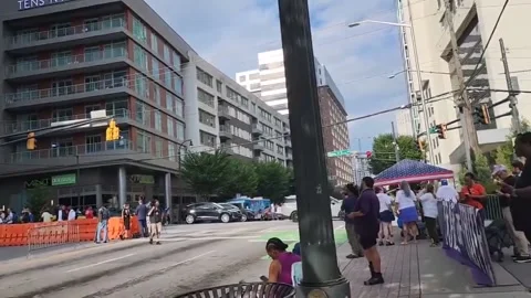 US: Demonstrators Protest Near CNN Atlanta Ahead Of Biden-Trump Presidential... Stock Footage 280493383
