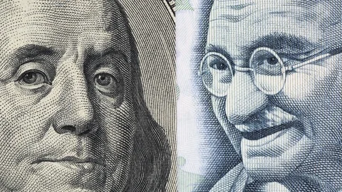 US dollar against India rupee tracking. Slider shot, top view. 4K, 422 10 bit Stock Footage 125557299