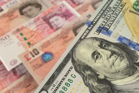 US Dollar and British Pound Sterling Banknotes. Cash. Financial Concept. Stock Photos