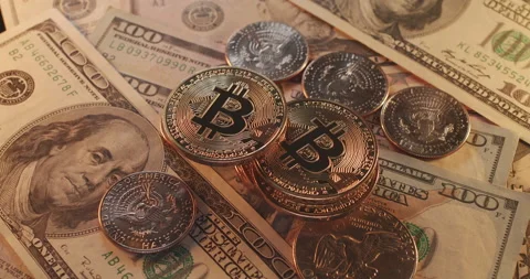 US Dollar and digital crypto currency Bitcoin. Gold and silver coins Stock Footage