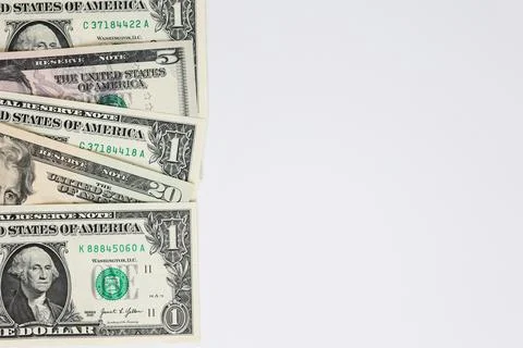 US Dollar Banknotes Border with Copy Space on White Background Stock Photos