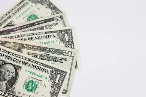 US Dollar Banknotes with Copy Space on White Background Stock Photos