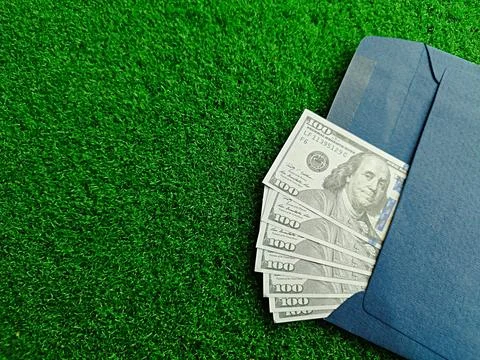 US Dollar banknotes in an envelope Stock Photos