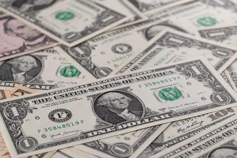 US Dollar Banknotes Scattered on Surface Stock Photos