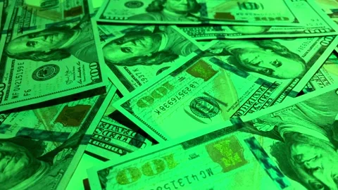 US dollar banknotes spread on table, close up view of cash money, green tones Video stock 283733291
