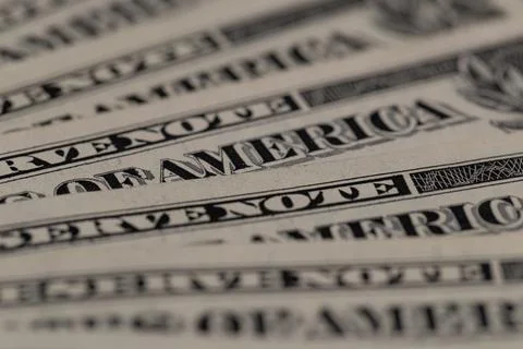 US dollar banknotes texture macro with focus on of America text Stock Photos
