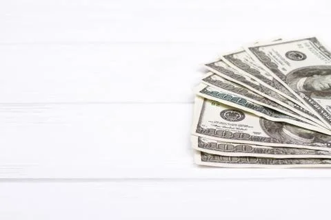 US dollar banknotes on white background. Stock Photos