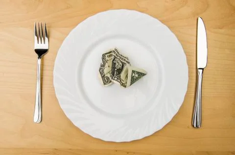 Us dollar bill on a plate Stock Photos