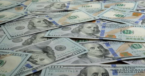 US Dollar bills one hundred dollar bills background close-up on a table Stock Footage 234213149