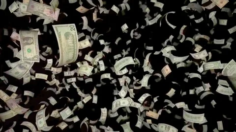 US Dollar Bills Raining Down on an Isolated Black Background Video stock 320040419