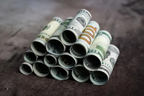 US dollar bills in rolls Stock Photos
