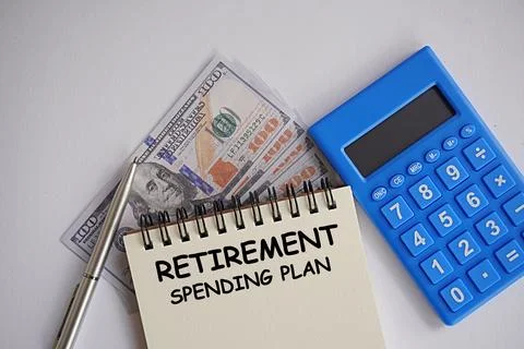 US Dollar, calculator and note retirement spending plan, financial concept Stock Photos