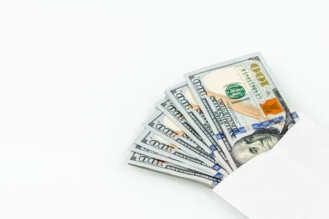 US dollars in a white envelope isolated on a white background. Concept of inc Foto stock
