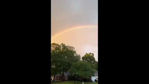 US: Double Rainbow Lights Up the Sky Over Abita Springs, Louisiana Stock Footage 335603056
