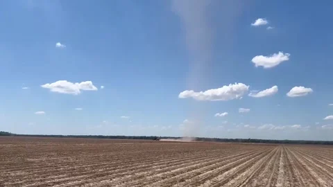 US: Dust Devil Spotted Whipping Through Field in Macon Lake, Arkansas Stock Footage 332526973