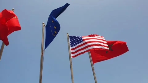 The US, EU, and Moroccan flags waving with wind Stock Footage 255134172
