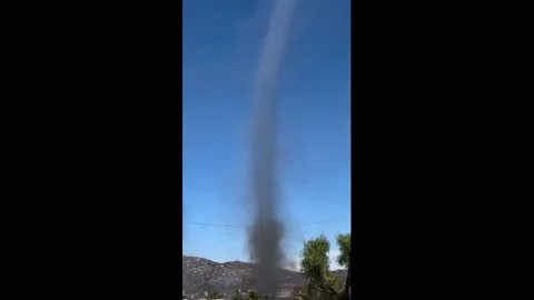 US: Fire Tornado Erupts As Verona Fire Rages Across Riverside County Stock Footage 335338765