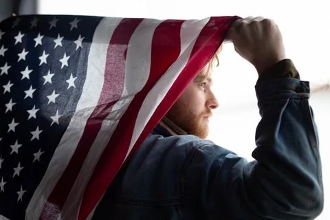US flag and a man Stock Photos