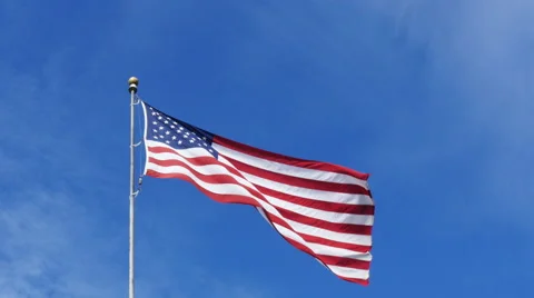US flag on blue sky background 4k Stock Footage 50867730
