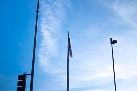 US Flag in the Blue sky Stock Photos