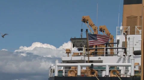 US Flag on Coast Guard Cutter - slow motion Stock Footage 8537930