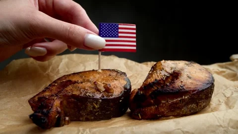 US flag on fish steak, symbol of local American ocean seafood. Stock Footage 323012975