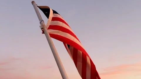 US flag flowing in sky. footage of Ameri... | Stock Video | Pond5