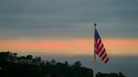The US flag flying high Stock Footage 75654864