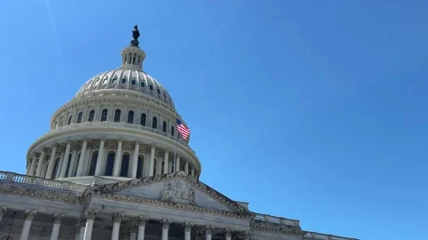 US flag flying at US Capitol Dome, Washington DC Stock Footage 284027062