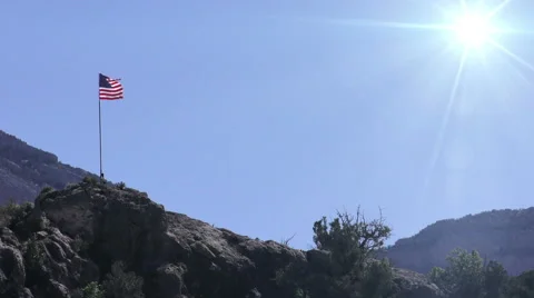 US Flag on Hill with Flare Stock Footage 49178847