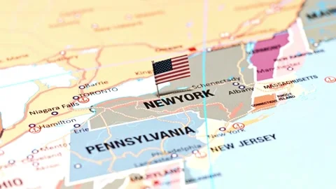 US Flag pin on a map of New York state Stock Footage 336398137