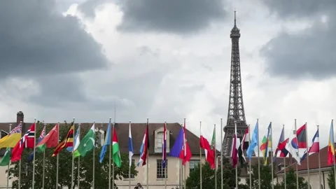 U.S. flag is raised again at Unesco headquarters after five years, París, FR - 2 Stock Footage 246756112