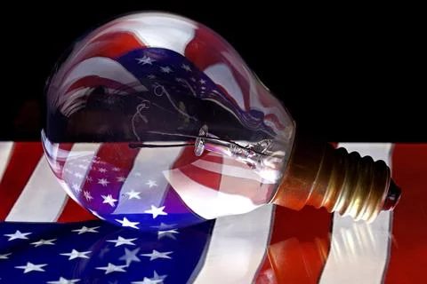 US flag reflected in light bulb Foto stock