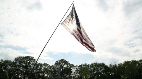 US Flag with sun behind it pan down to Mausoleum Stock Footage 38794510