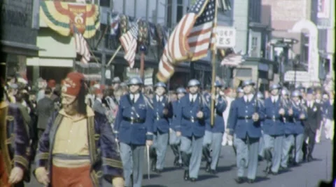 US Flag Waves VETERANS WW1 Soldiers Parade 1950s Vintage Film Home Movie 1572 스톡 동영상 9839384